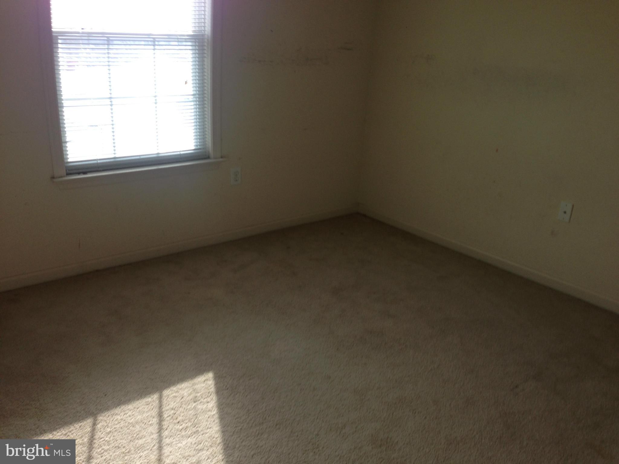 112 Estate Lane Ranson, WV 25438 - Photo 10 of 12 an empty room with a window