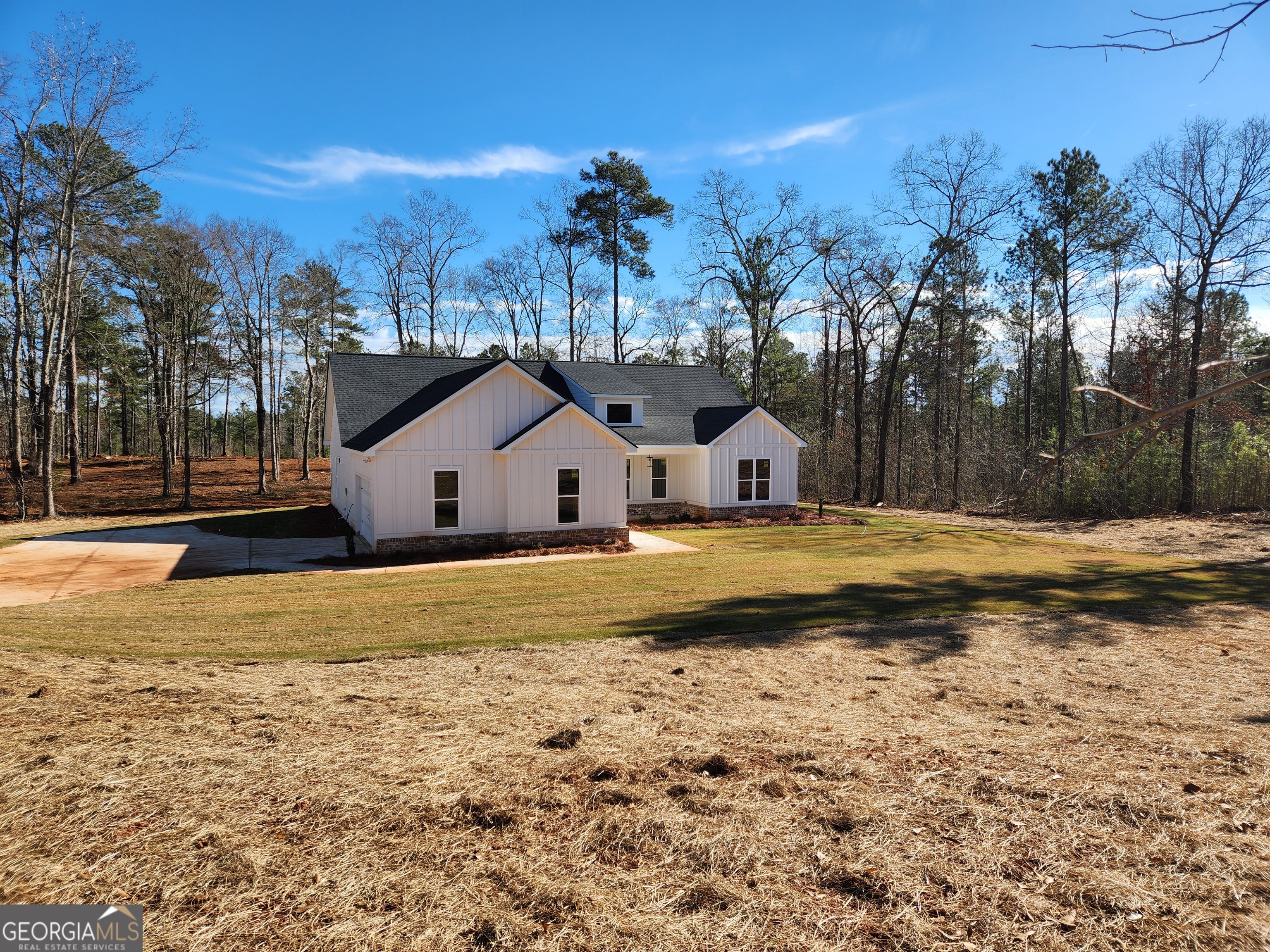 606 Dean Patrick Road Locust Grove, GA 30248 - Photo 3 of 7 a swimming pool view with a lake view