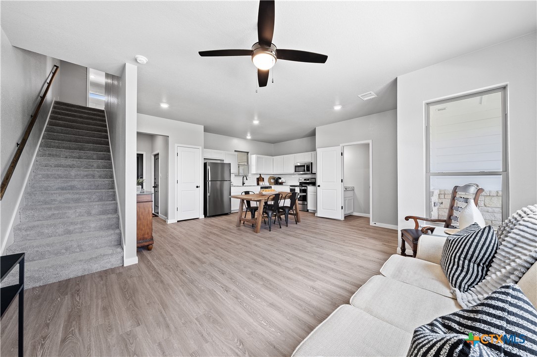 723 Meiomi Drive Temple, TX 76502 - Photo 7 of 19 a living room with furniture and wooden floor