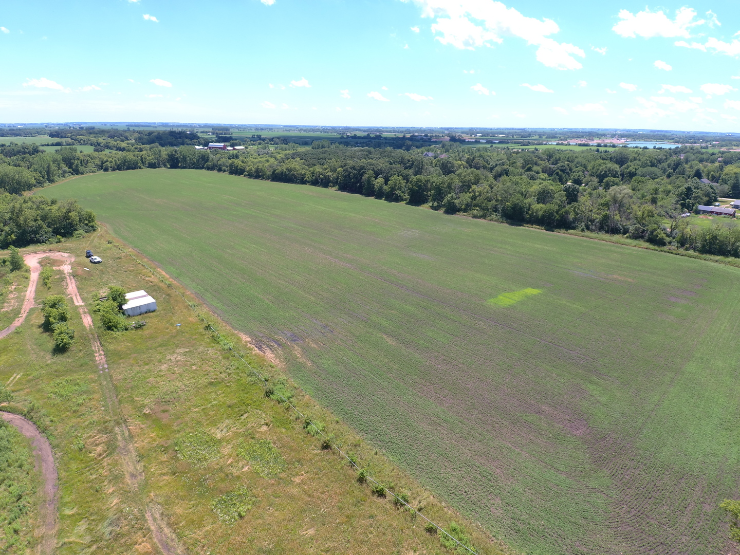 49.64-acres Beck Road Marengo, IL 60152 - Photo 26 of 33 a view of a lake with a mountain