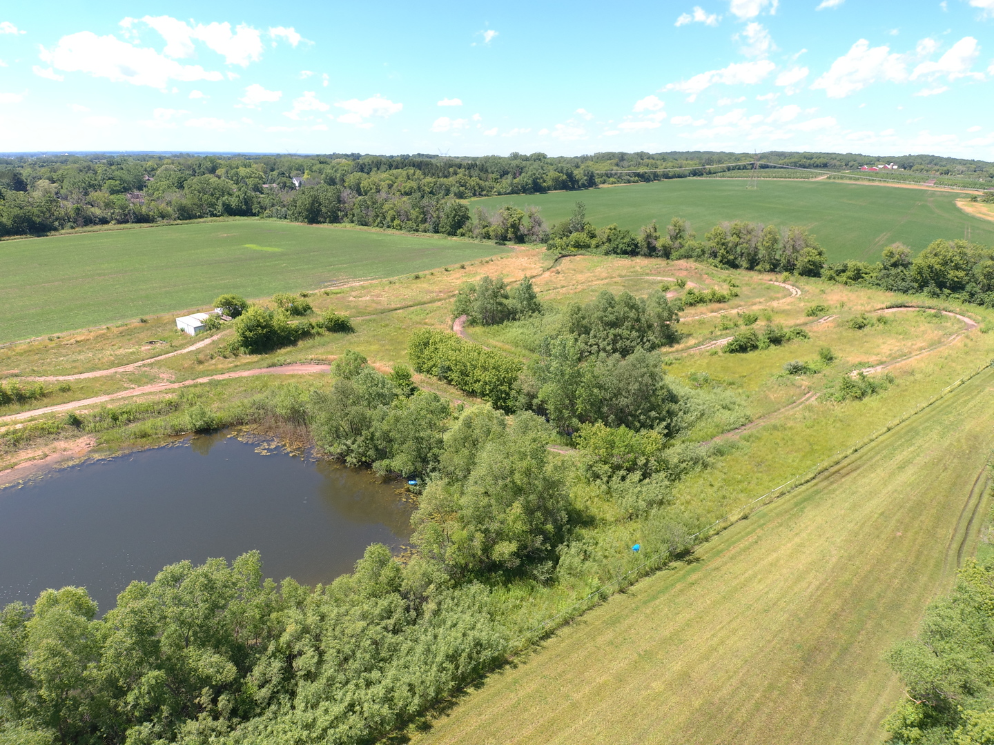 49.64-acres Beck Road Marengo, IL 60152 - Photo 29 of 33 a view of a lake with a mountain