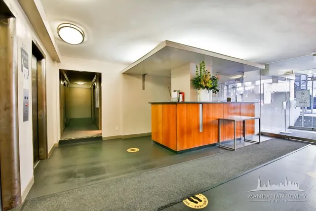 a view of a living room and bathroom