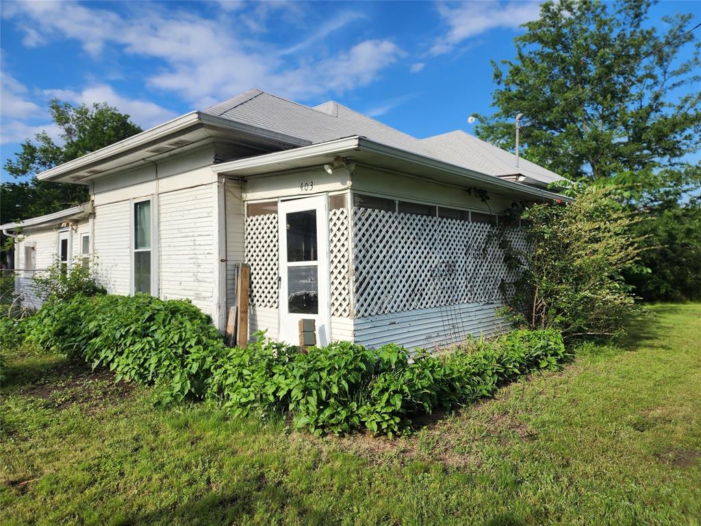 403 Barker Street Cumby, TX 75433 - Photo 16 of 16 White exterior with a light-colored roof
