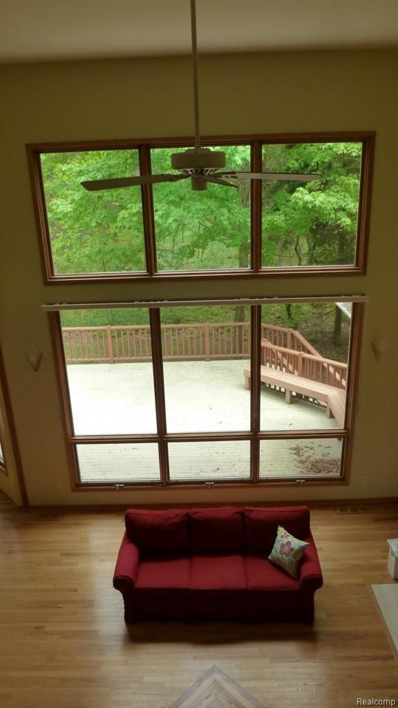 1196 Timber Ridge Court Milford, MI 48380 - Photo 21 of 30 Great Rm & Deck from 2nd Flr bridge