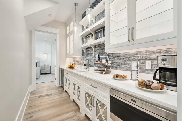 a spacious bedroom with a bed and a couch