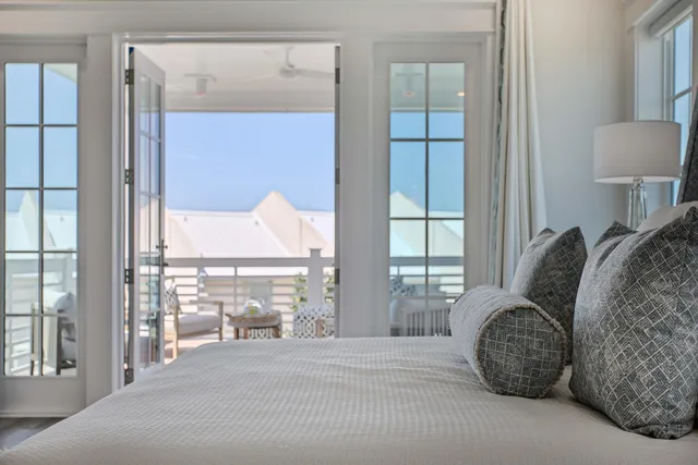 a bathroom with a double vanity sink a mirror and a bathtub
