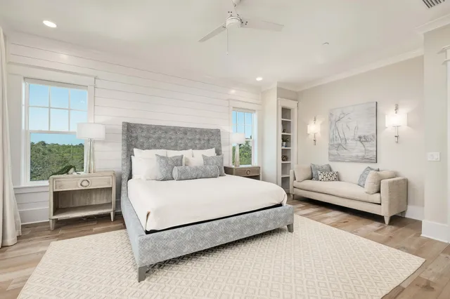 a living room with dining room and window