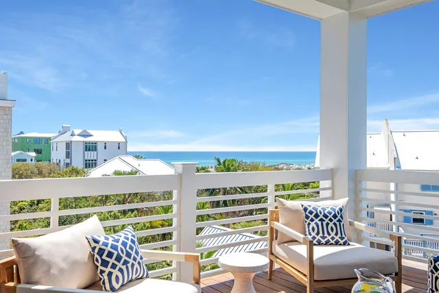 a bedroom with bed and flat screen tv