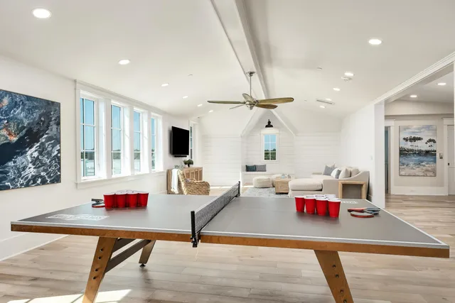a bathroom with a sink vanity granite toilet and a mirror