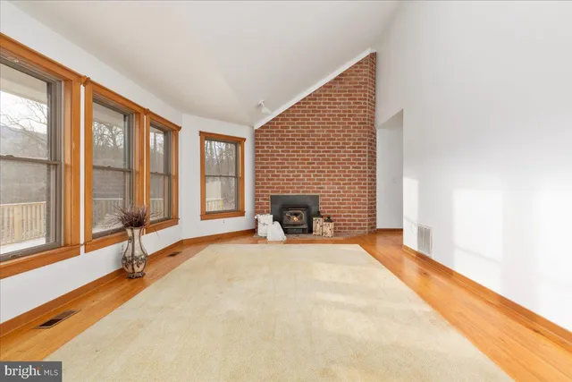 a bathroom with a toilet a sink and a mirror