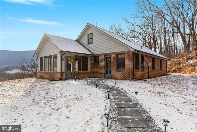 a view of a backyard of a house