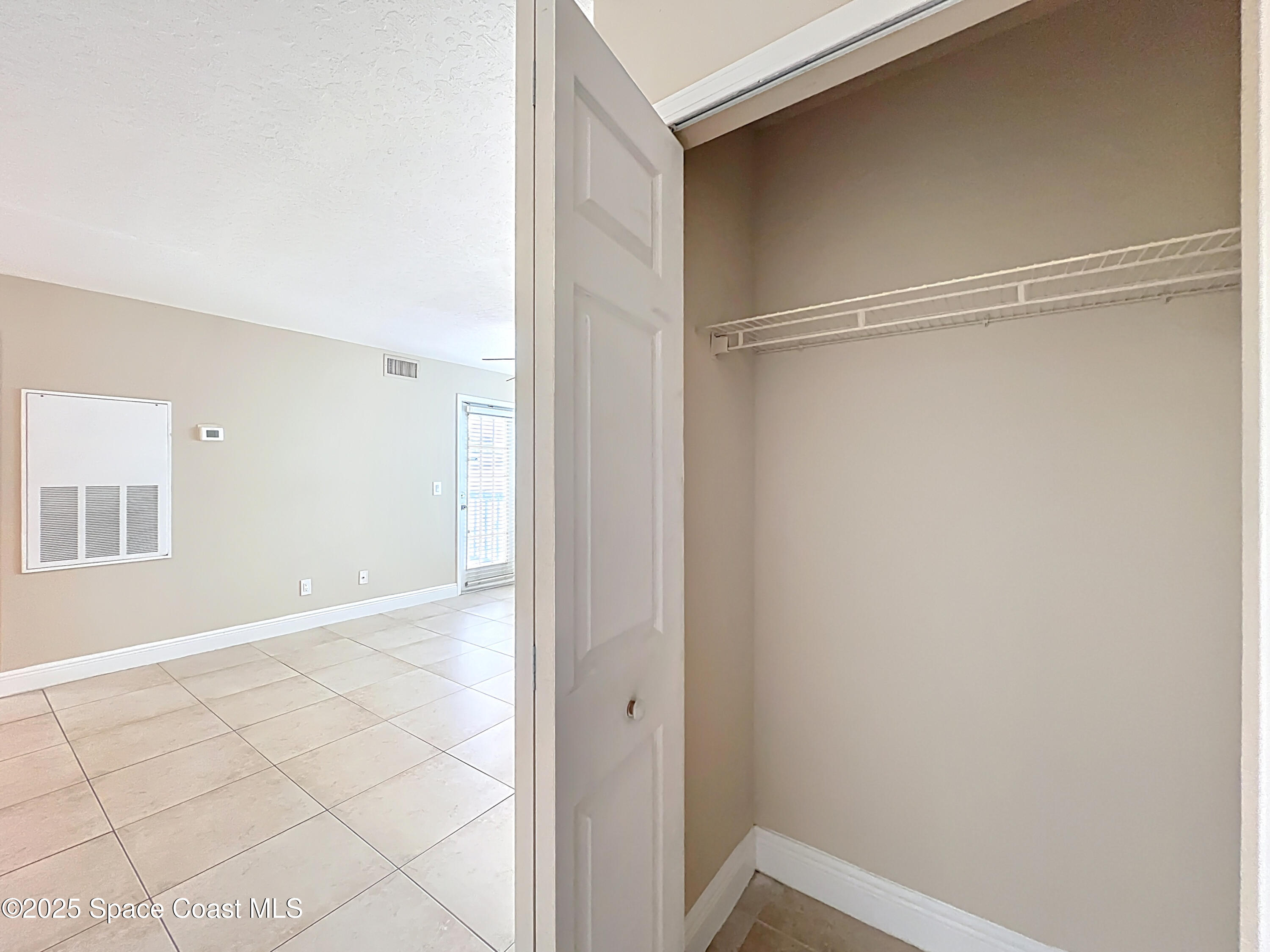 7667 North Wickham Road, Unit 410 Melbourne, FL 32940 - Photo 19 of 37 a view of an empty room