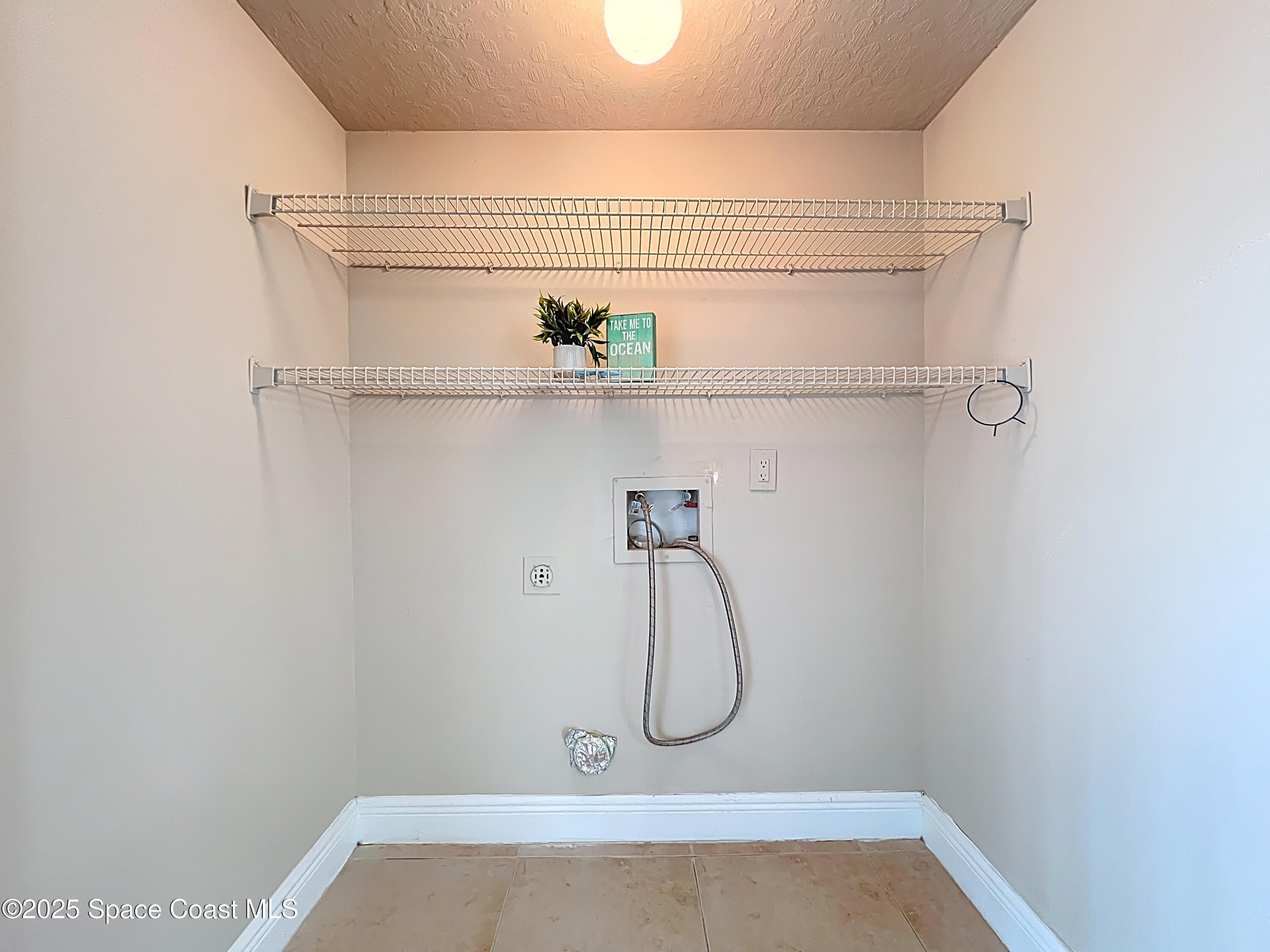 7667 North Wickham Road, Unit 410 Melbourne, FL 32940 - Photo 20 of 37 a bathroom with a shower