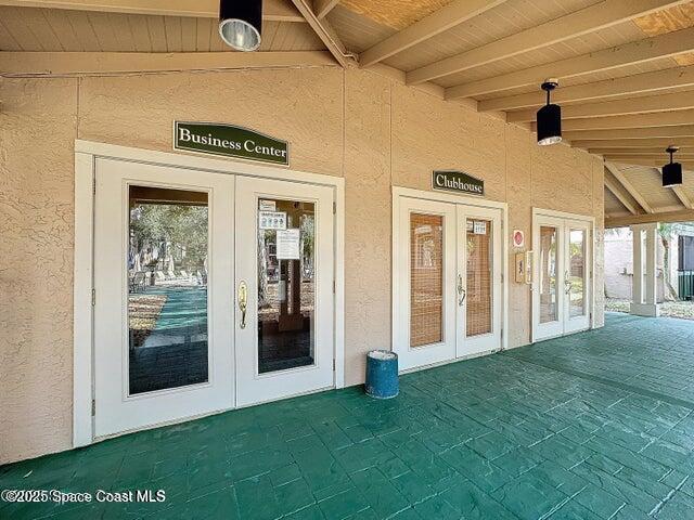 7667 North Wickham Road, Unit 410 Melbourne, FL 32940 - Photo 25 of 37 a view of front door of a house