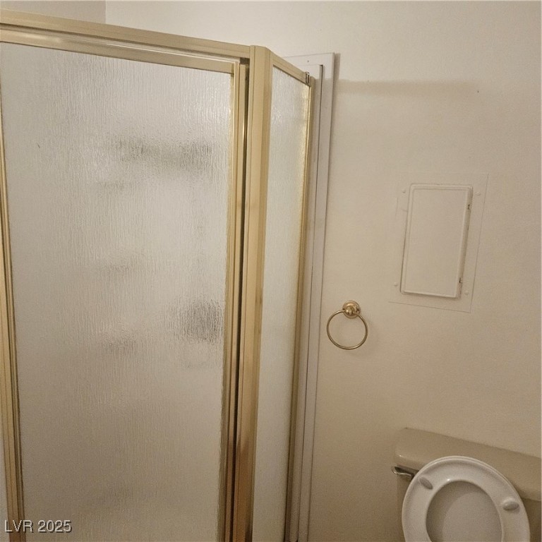 350 East Desert Inn Road, Unit C203 Las Vegas, NV 89109 - Photo 19 of 35 Bathroom featuring a stall shower and electric panel