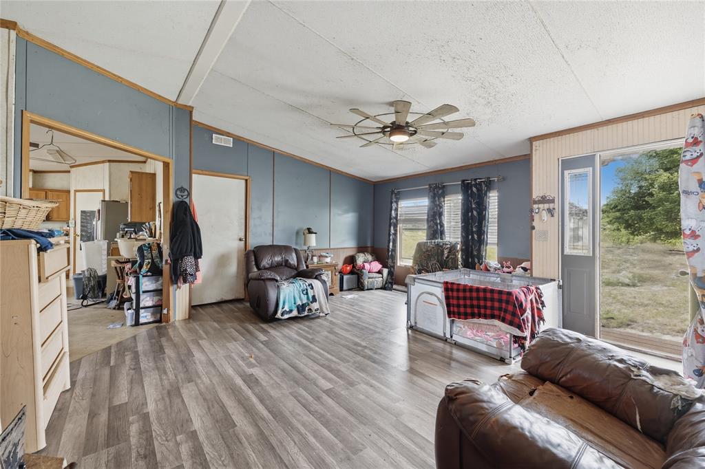 2449 East Fm 120 Denison, TX 75021 - Photo 27 of 30 a living room with furniture and a large window