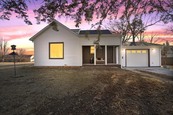 a house view with a garden space