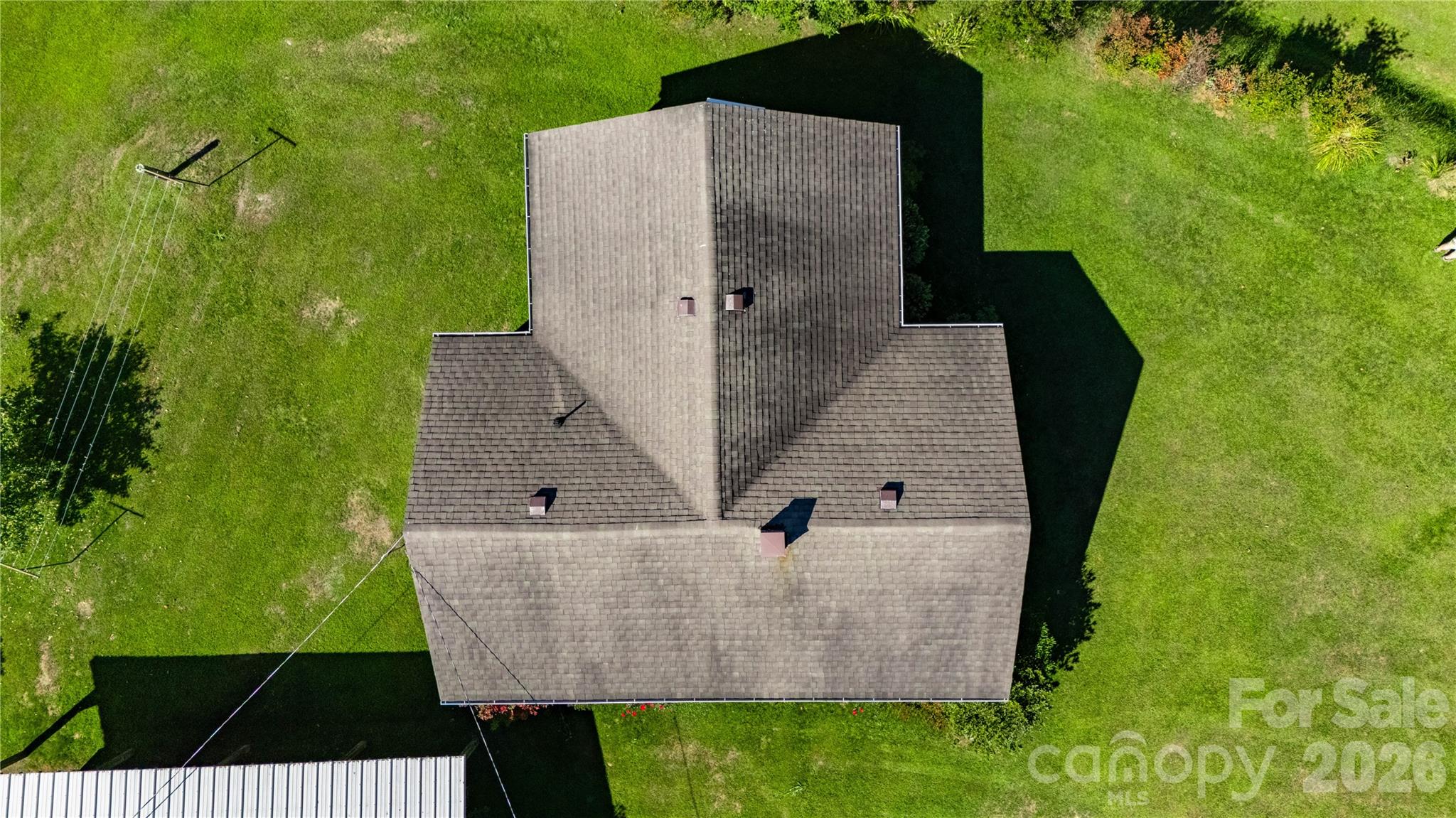 580 Russ Norris Heaton Road Elk Park, NC 28622 - Photo 40 of 42 an aerial view of a house with a yard