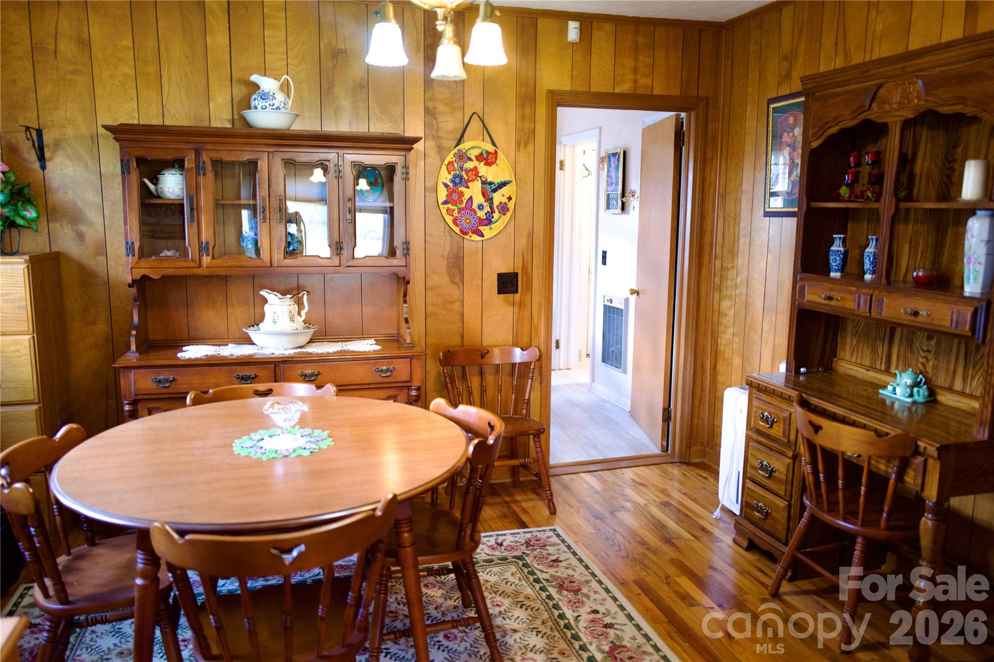 580 Russ Norris Heaton Road Elk Park, NC 28622 - Photo 9 of 42 a view of a dining room with furniture and wooden floor