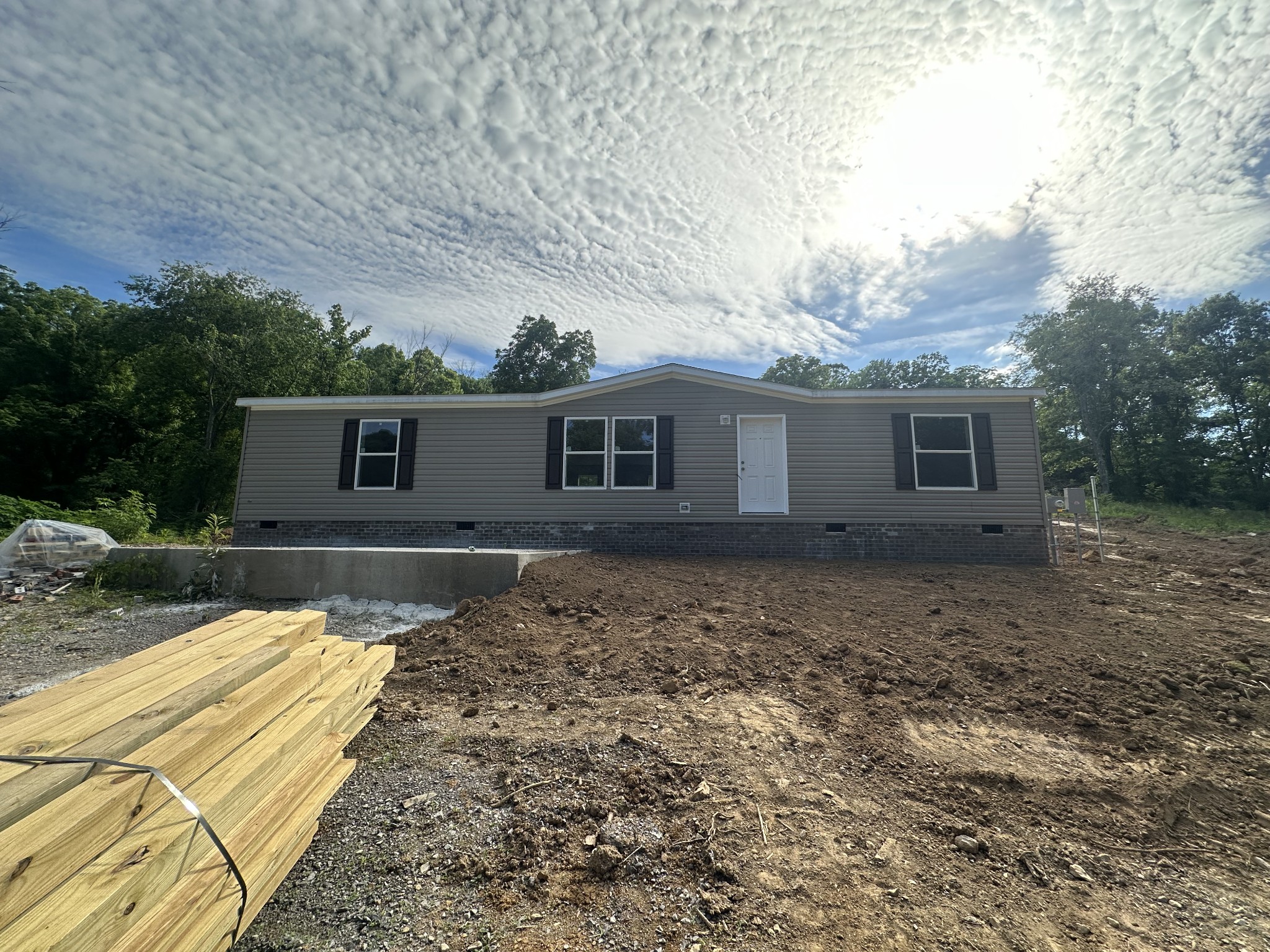 406 Shiloh Church Road Woodbury, TN 37190 - Photo 2 of 18 front view of house with a yard