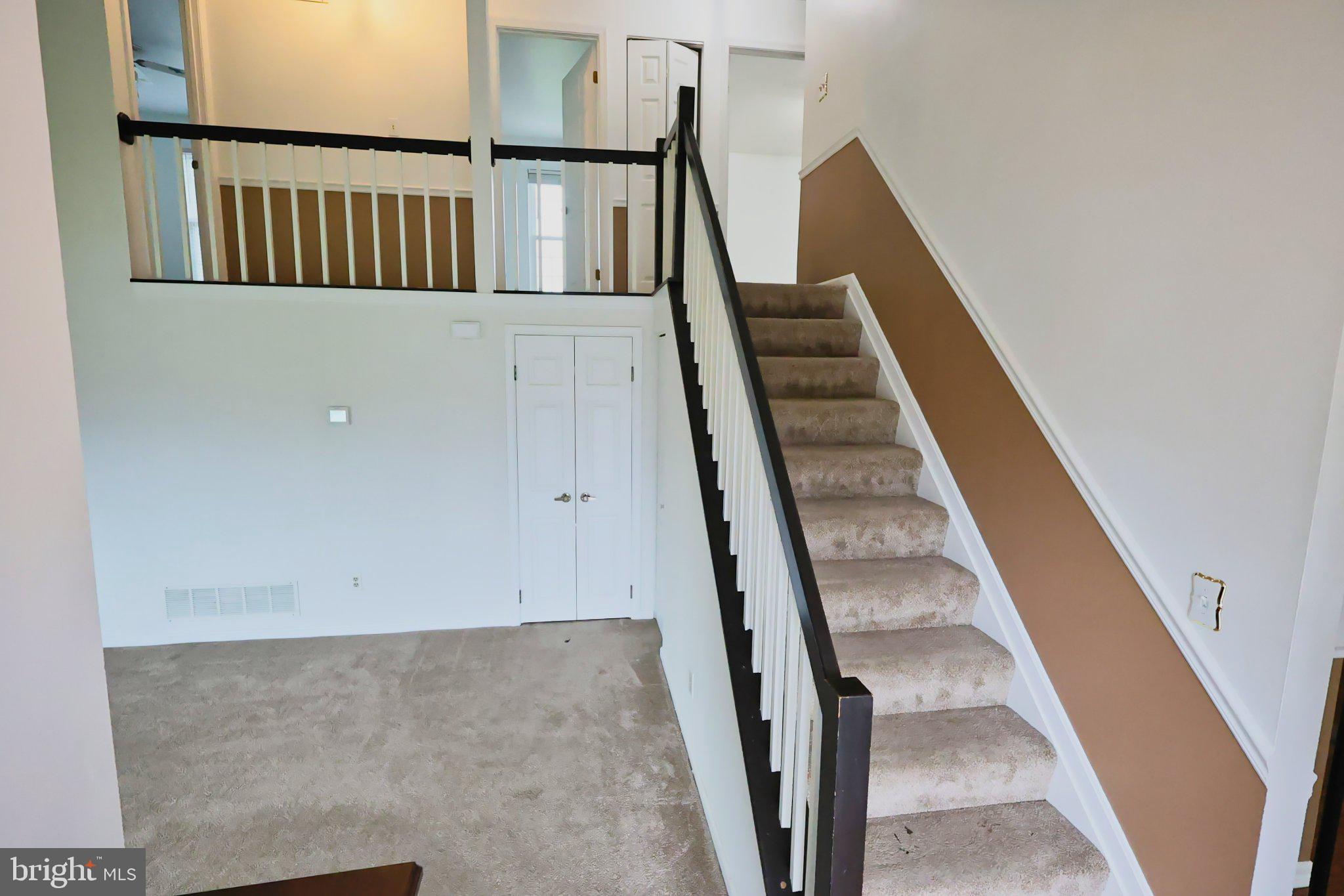 4402 Fieldgreen Road Nottingham, MD 21236 - Photo 9 of 52 Inviting entryway with elegant staircase.