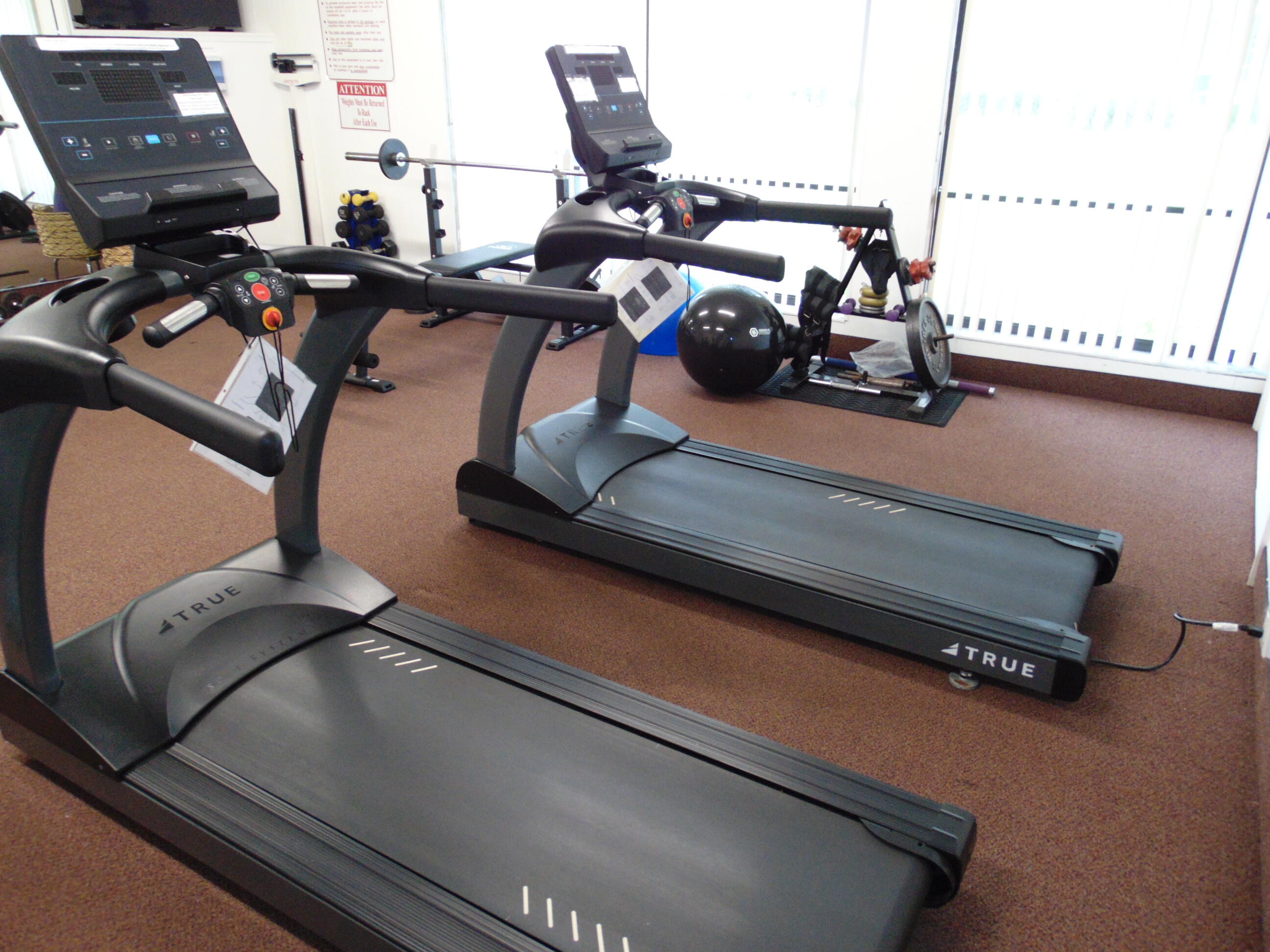 9220 Southwest 14th Street, Unit 3103 Boca Raton, FL 33428 - Photo 57 of 58 a view of a room with gym equipment