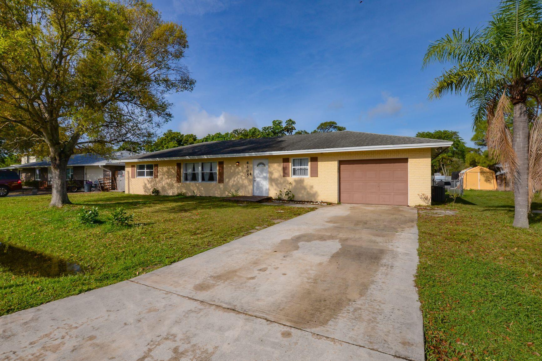 6105 Raintree Trail Fort Pierce, FL 34982 - Photo 35 of 35 Driveway