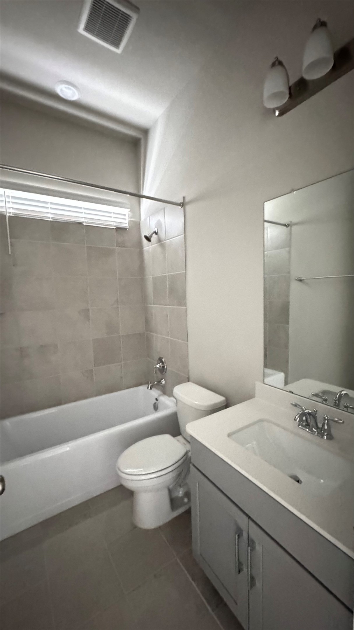 3005 Manor Heights Lane Houston, TX 77063 - Photo 14 of 35 a bathroom with a sink a toilet and a bathtub