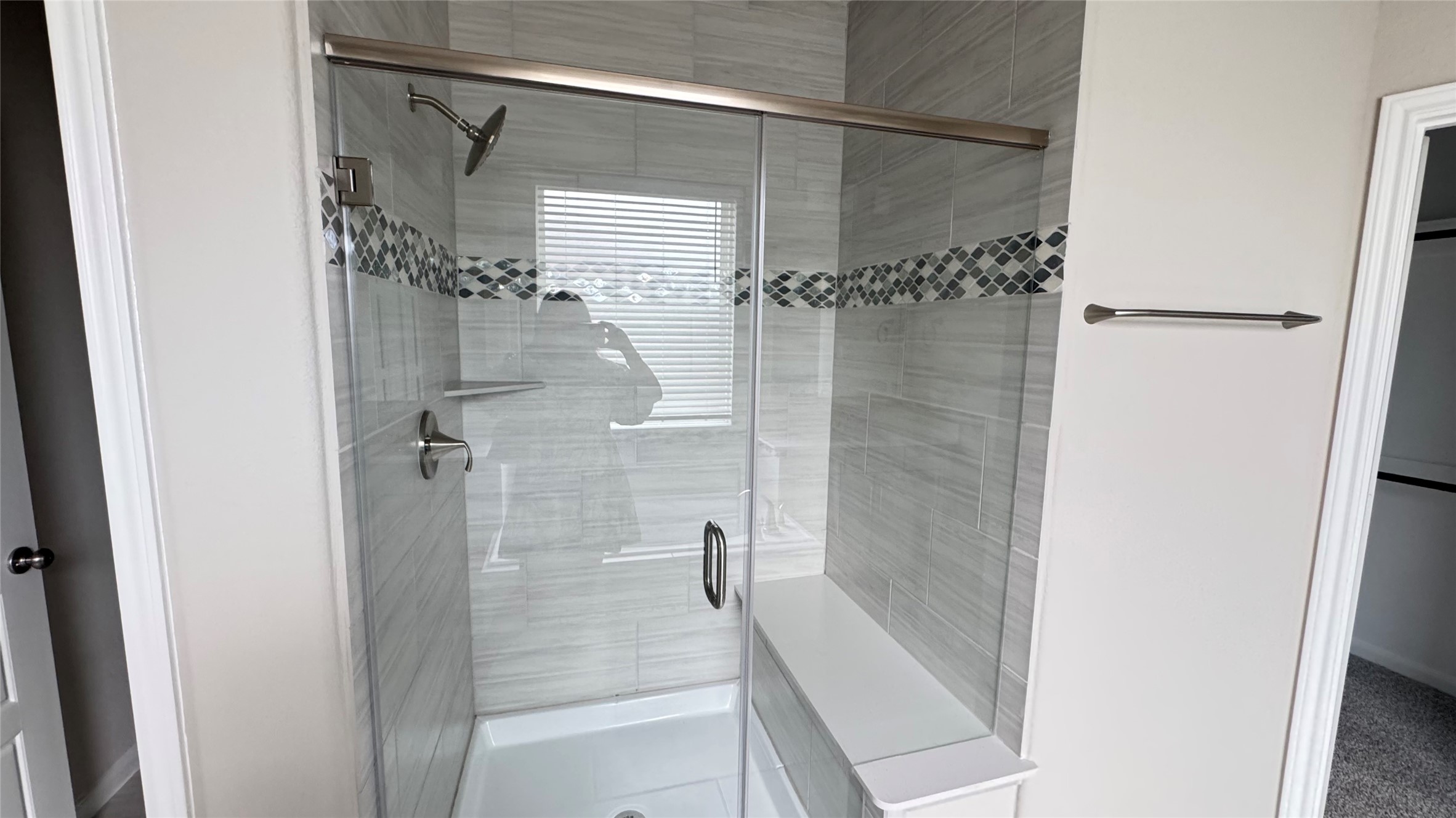 3005 Manor Heights Lane Houston, TX 77063 - Photo 25 of 35 a bathroom with a shower and a glass door