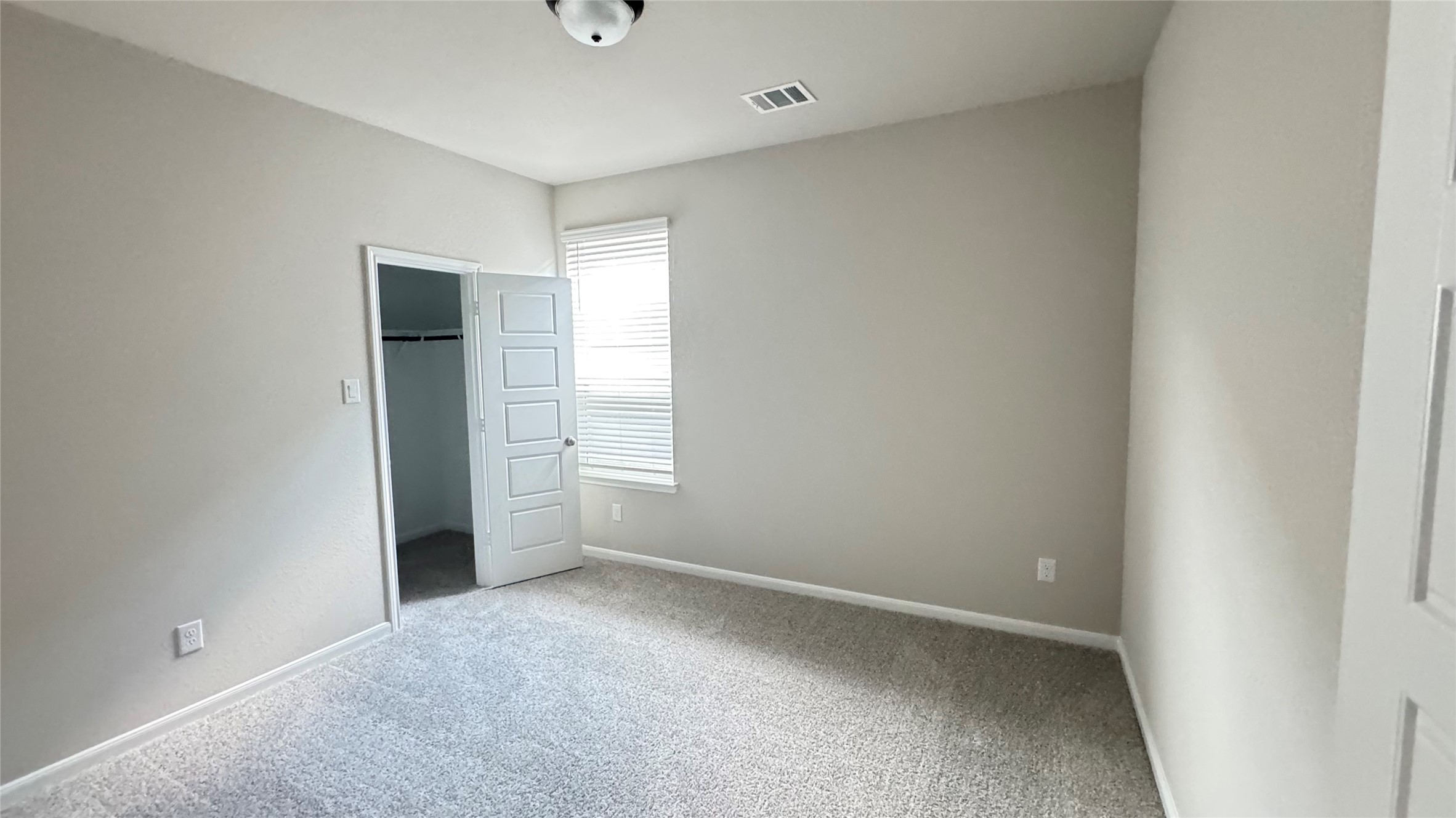 3005 Manor Heights Lane Houston, TX 77063 - Photo 28 of 35 a view of an empty room and window