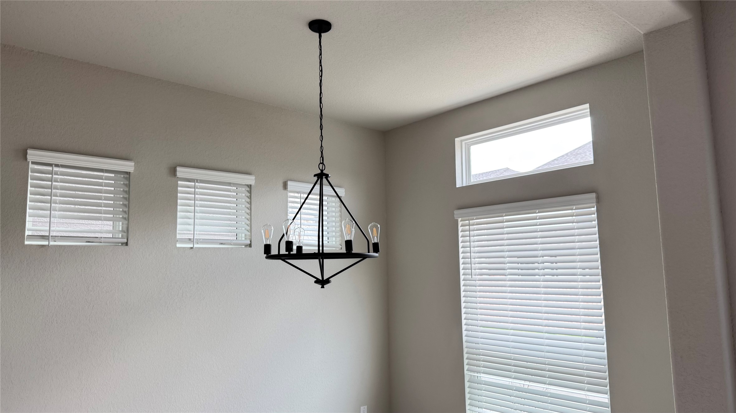 3005 Manor Heights Lane Houston, TX 77063 - Photo 34 of 35 a view of a room with a window and ceiling fan