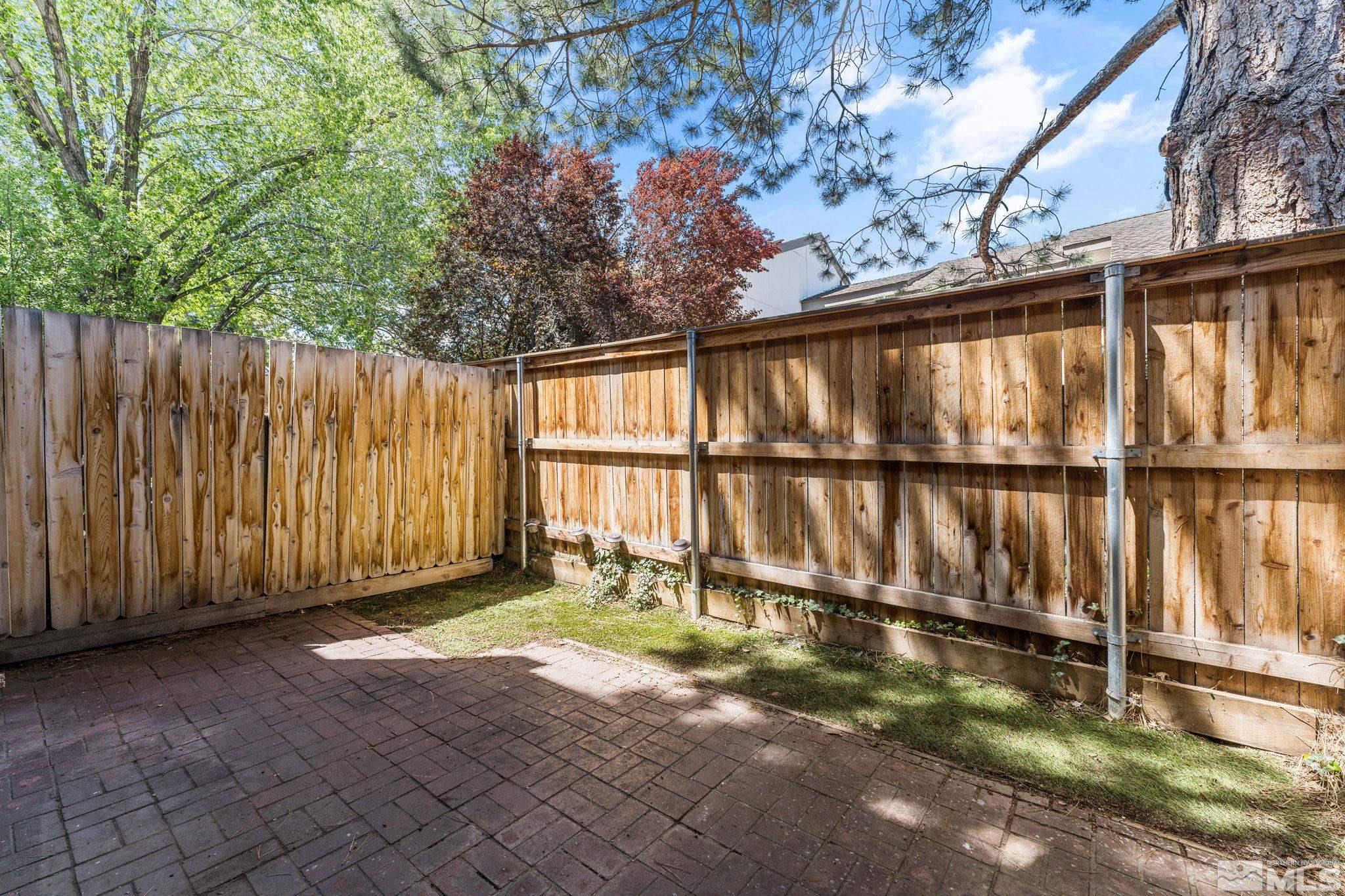 4185 Baker Lane Reno, NV 89509 - Photo 26 of 29 a view of backyard with wooden fence
