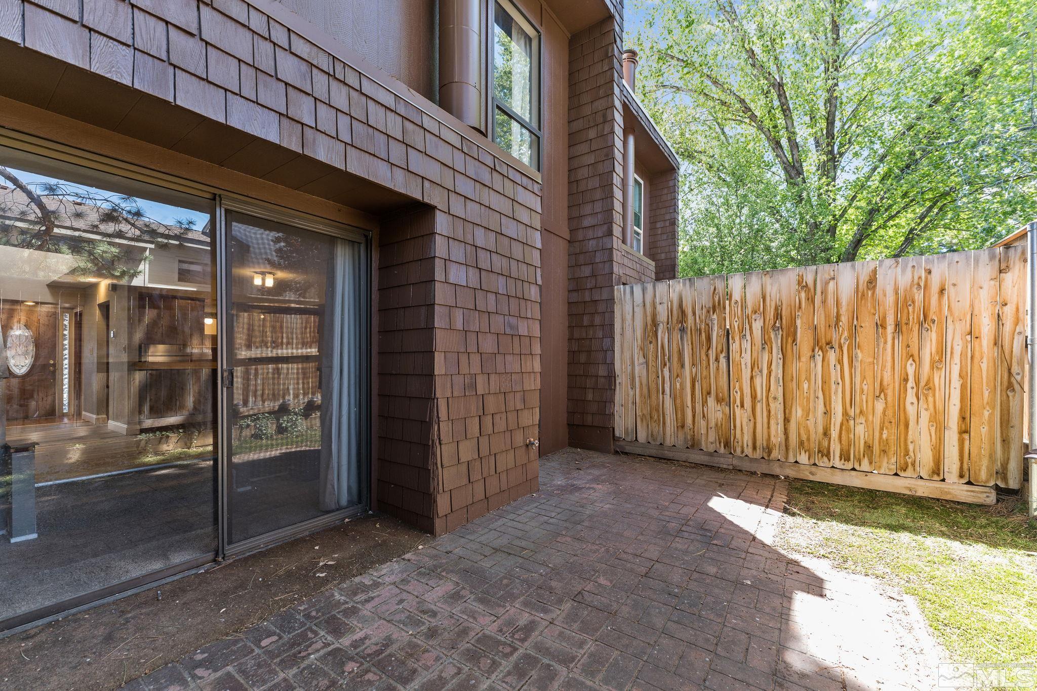 4185 Baker Lane Reno, NV 89509 - Photo 29 of 29 a view of a house with backyard and wooden fence
