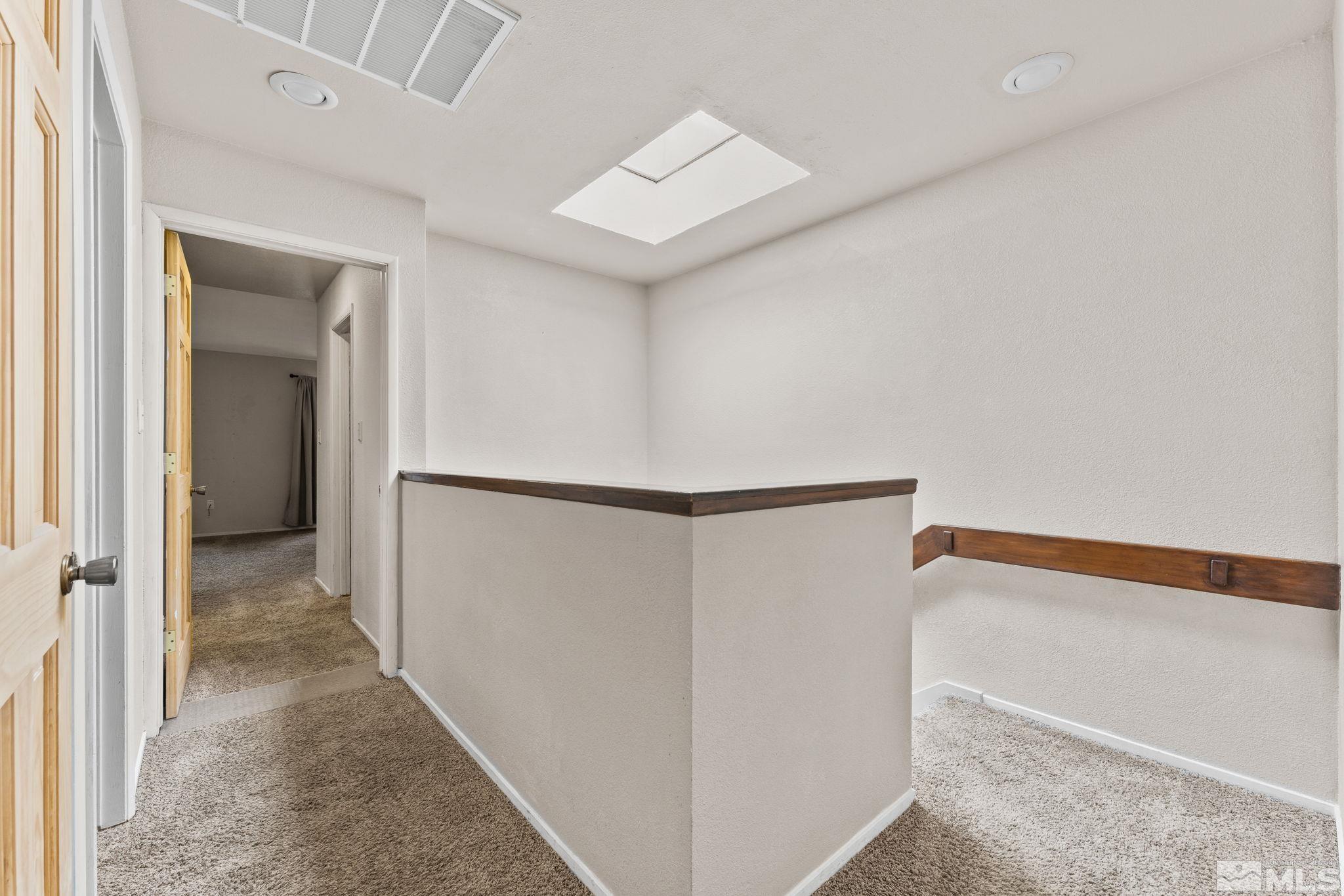 4185 Baker Lane Reno, NV 89509 - Photo 9 of 29 a view of a hallway with closet and entryway