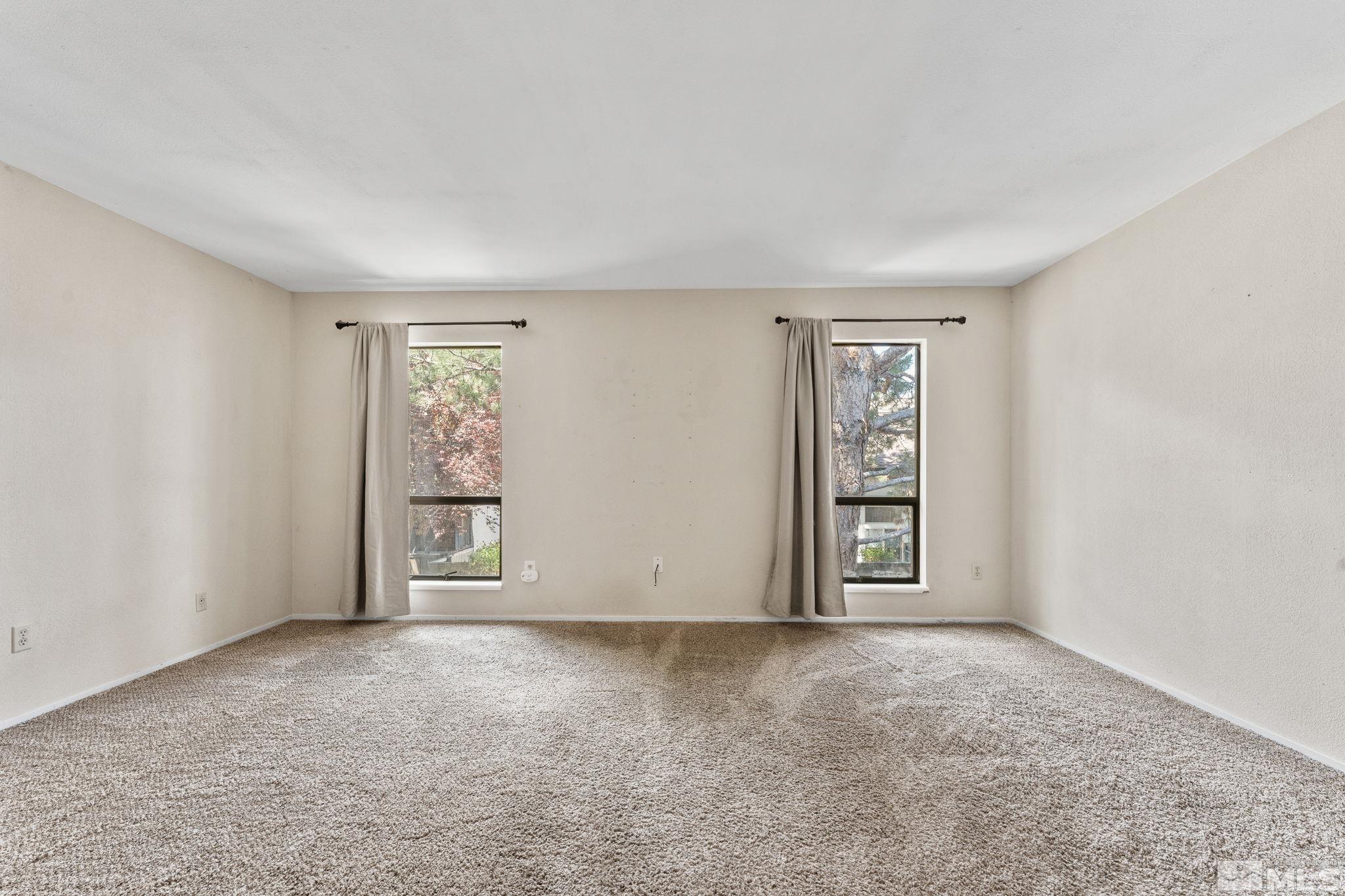 4185 Baker Lane Reno, NV 89509 - Photo 10 of 29 an empty room with windows