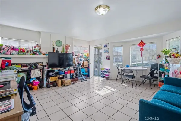 a kitchen with stainless steel appliances granite countertop a refrigerator and a stove