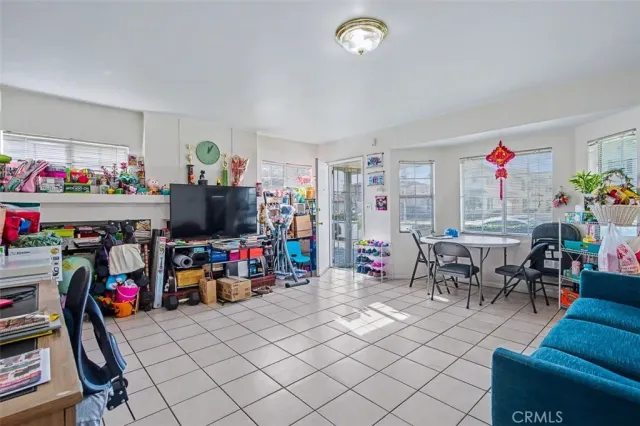 a kitchen with stainless steel appliances granite countertop a refrigerator and a stove