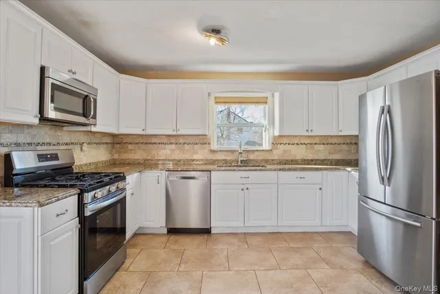 $725,000 | 25 Ford Drive West, Massapequa, NY 11758