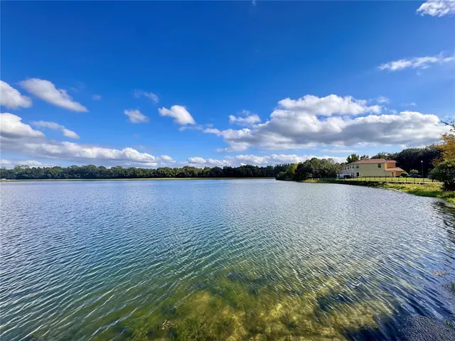 a view of a lake from a balcony