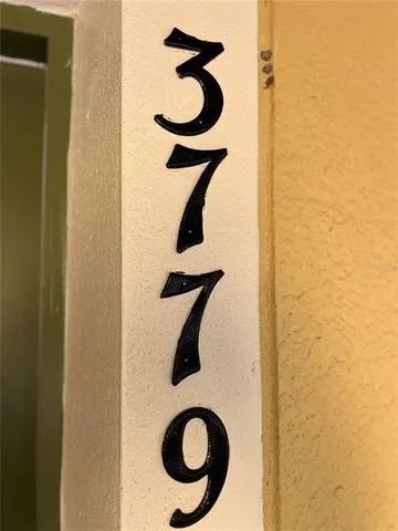 a kitchen with stainless steel appliances granite countertop a refrigerator a sink a stove a microwave a counter space and cabinets