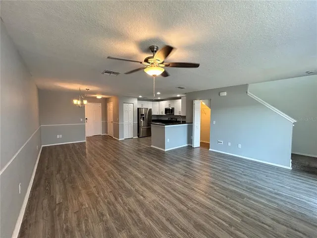 a bathroom with a sink toilet and mirror