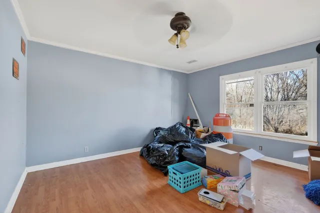 a room with furniture and a window