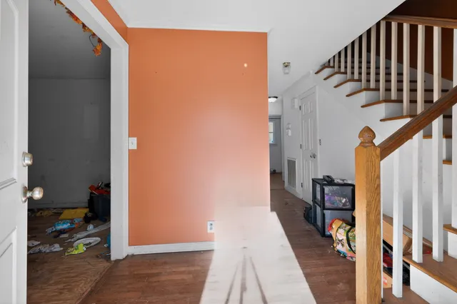 a view of a balcony with wooden floor