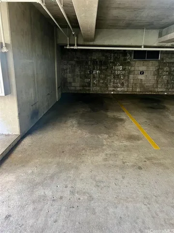 a view of a patio with couches chairs and wooden floor
