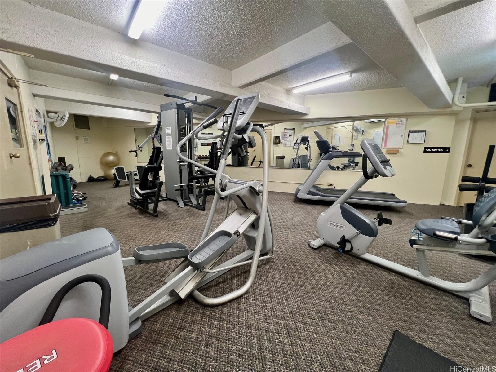 469 Ena Road, Unit 2010 Honolulu, HI 96815 - Photo 20 of 25 a view of a room with gym equipment