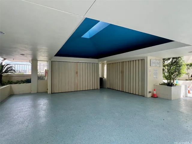 a view of a tree in front of a house