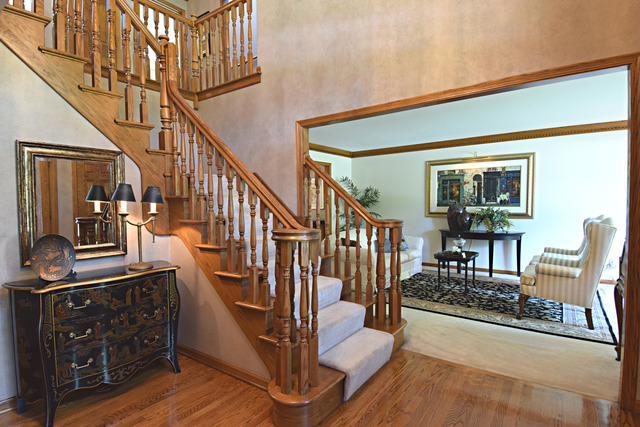 2907 Turnberry Road St. Charles, IL 60174 - Photo 3 of 25 a view of entryway livingroom and hall with wooden floor