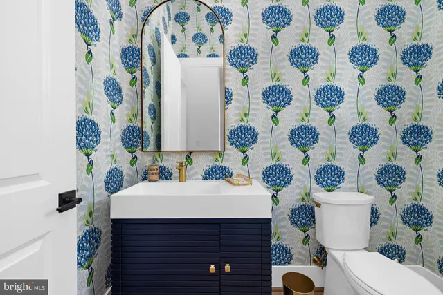 a bathroom with a sink and a toilet