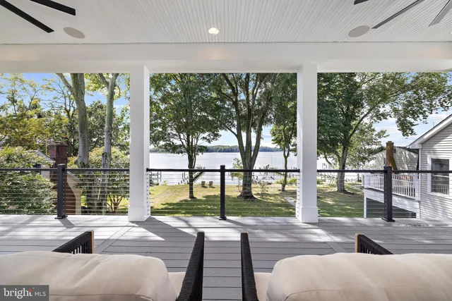 a view of porch with a yard