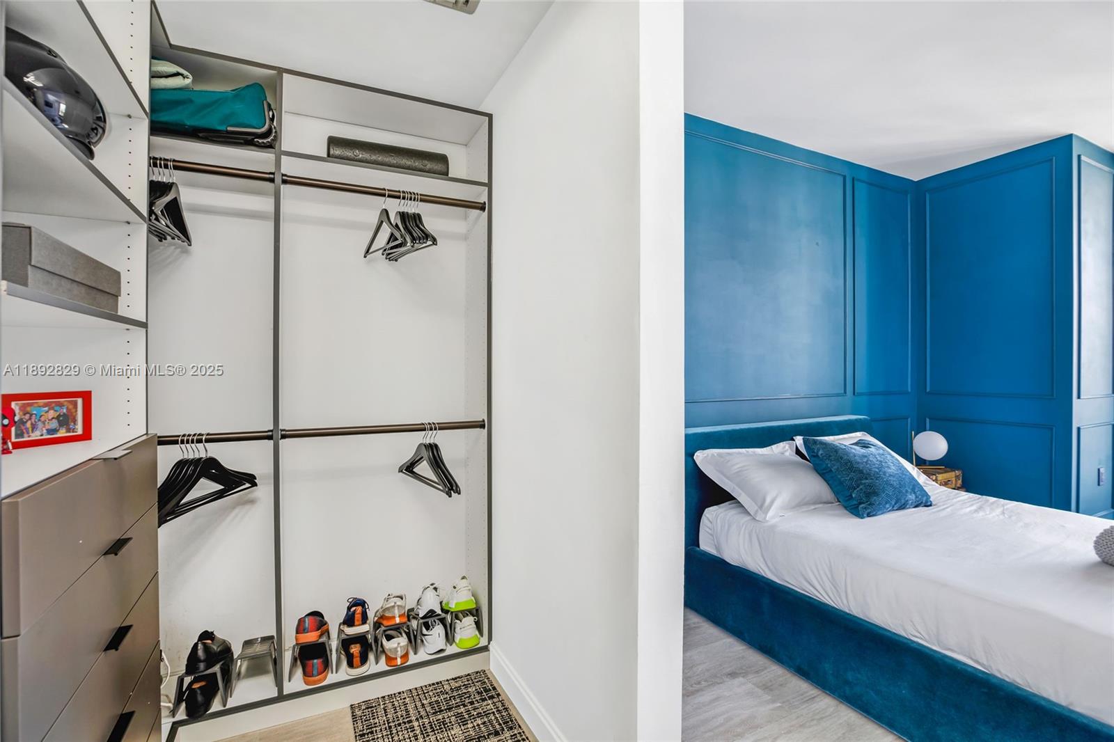 55 Southwest 9th Street, Unit 3205 Miami, FL 33130 - Photo 3 of 39 a bedroom with a bed and a window